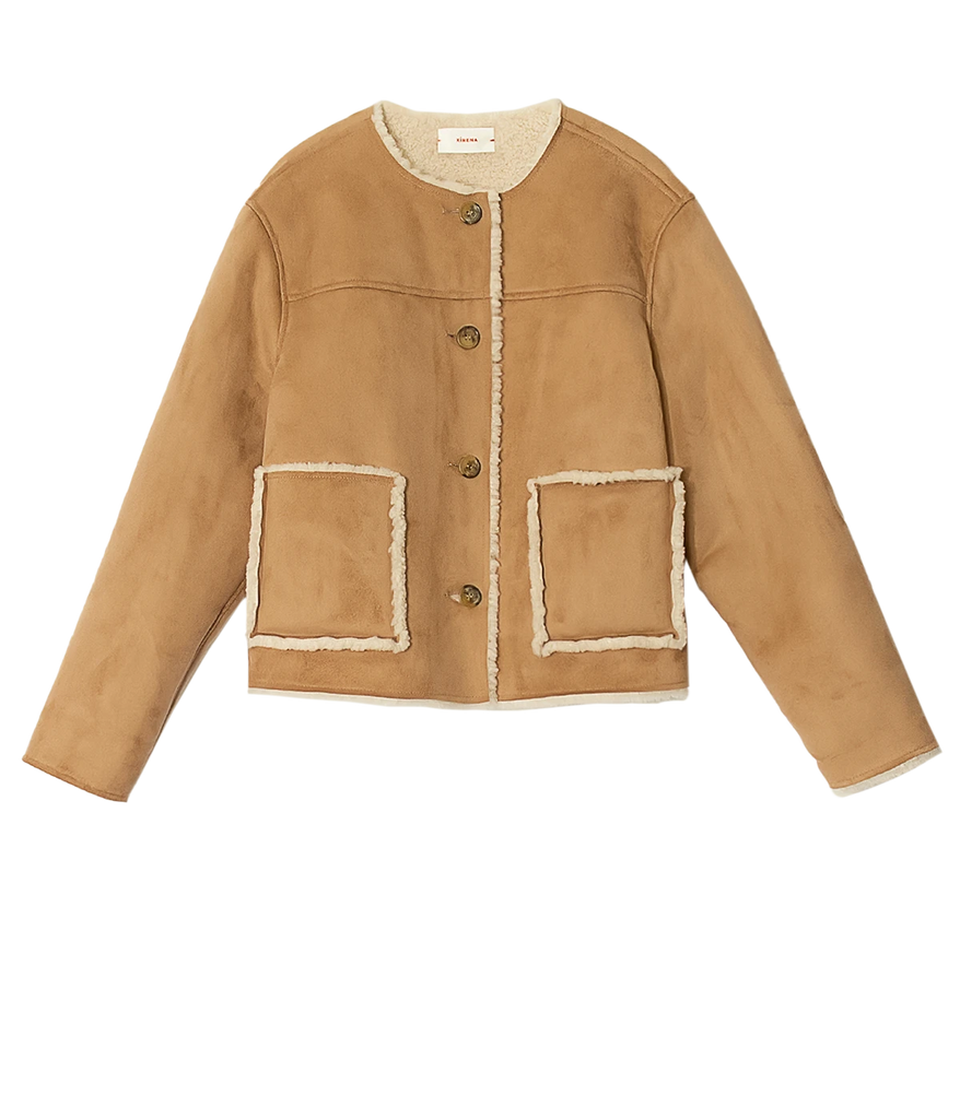 A shearling long sleeve jacket in a camel suede, contrast shearling pocket detailing, button down, winter jacket, bra friendly, made in USA, scoop neckline. 