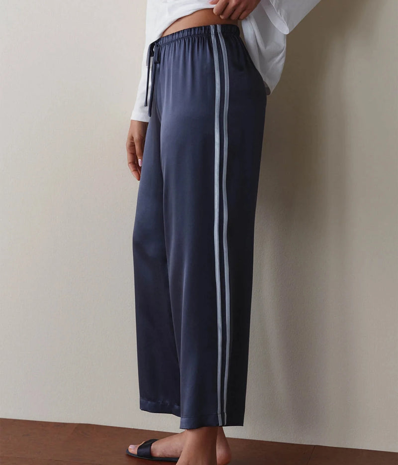 DONNI Silk Stripe Crop Pant in Navy Cloud, side profile view on model