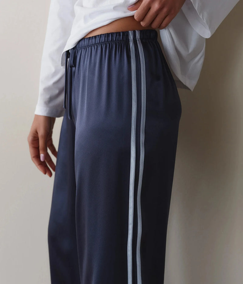 DONNI Silk Stripe Crop Pant in Navy Cloud, side profile view on model