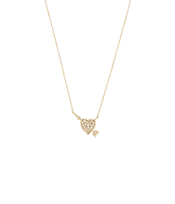 A tiny gold heart and arrow with hand set pavé diamonds this 14k yellow gold necklace features and adjustable chain. Everyday wear, gold jewellery, heart shaped jewellery, gold necklace.