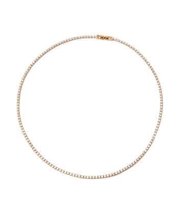 A classic everyday crystal necklace with yellow clasp detailing. Date night, layering piece, comfortable, quiet luxury, effortless, made internationally.
