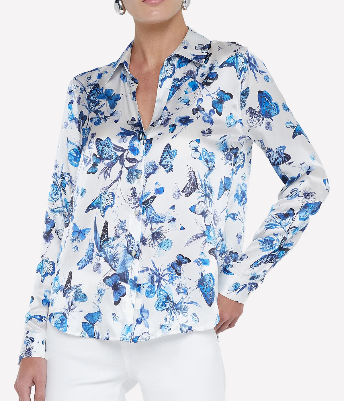 Silk shirt with a sharp collar, back pleated yoke, and long button-cuff sleeves, available in multiple colours and prints.