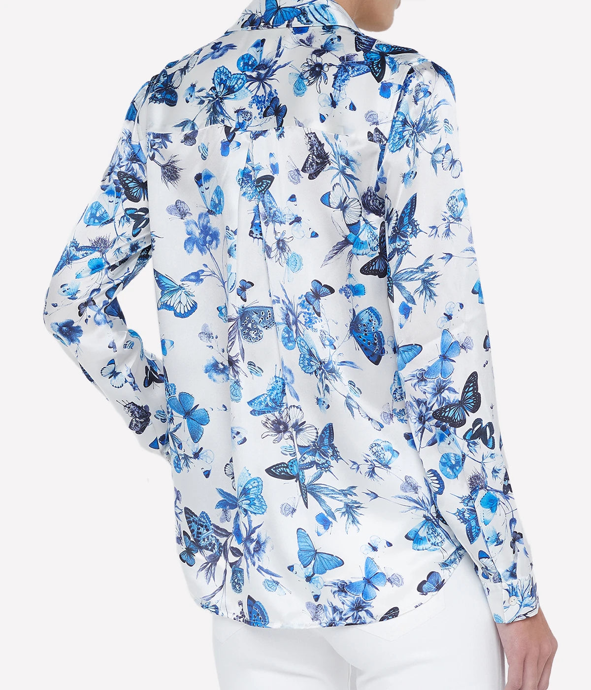 Silk shirt with a sharp collar, back pleated yoke, and long button-cuff sleeves, available in multiple colours and prints.