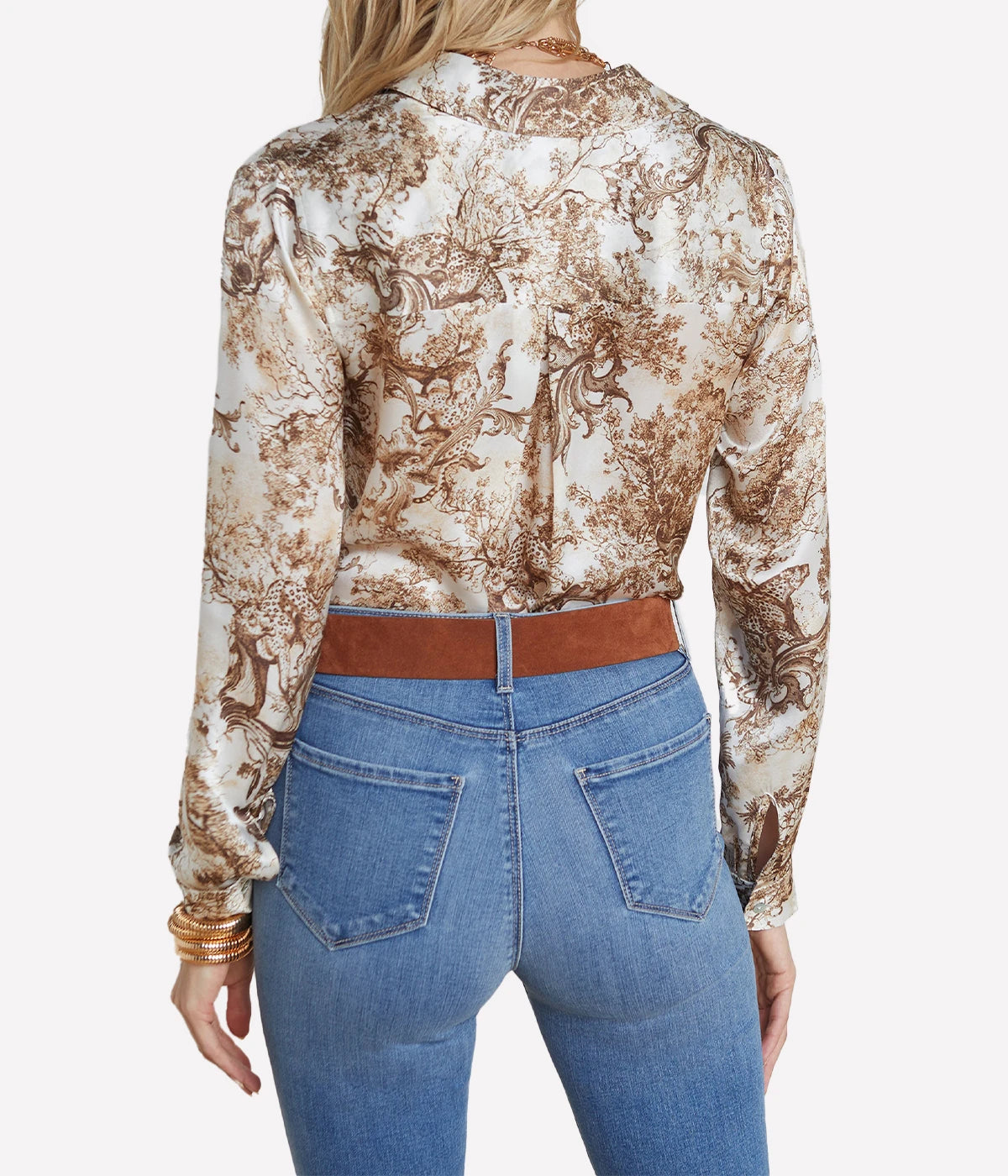 ALT Text: Silk button-down shirt with a sharp collar, pleated back yoke, and long sleeves, offered in various colours and prints.