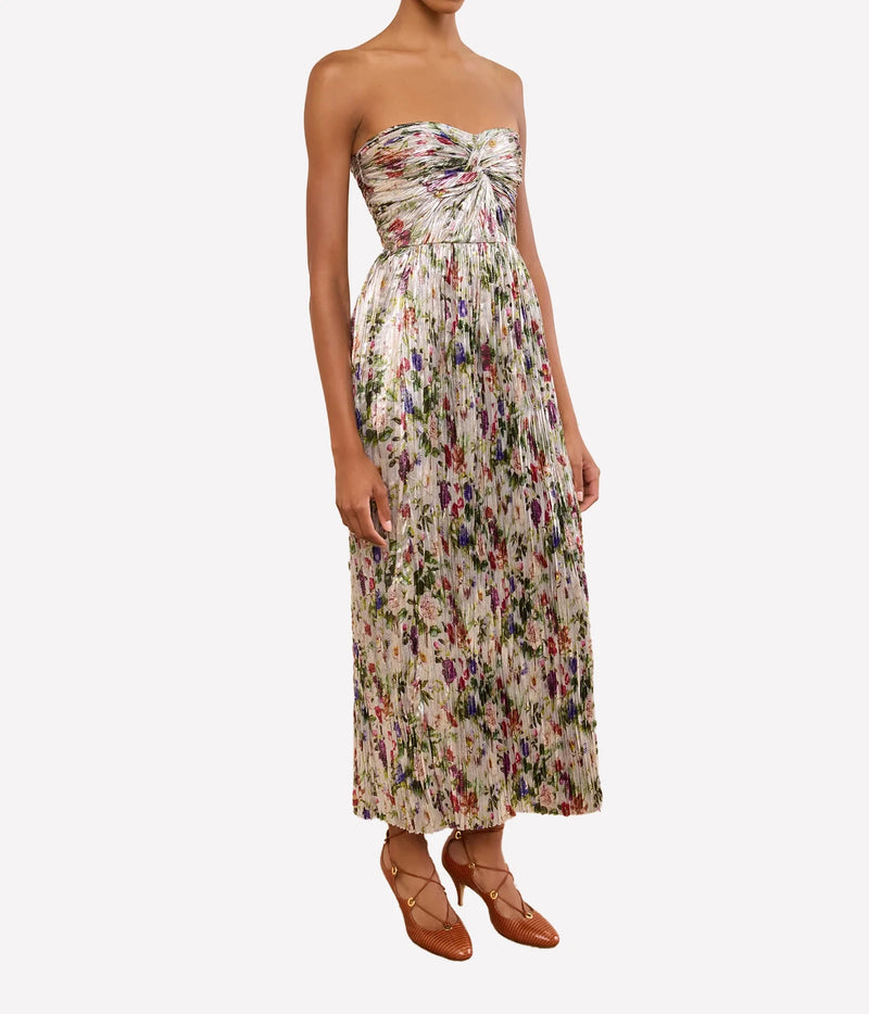 Model wearing Ulla Johnson Adelaide Strapless Pleated Dress in Sterling Floral, front view