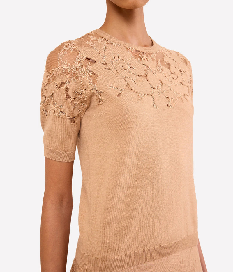 Model wearing Ulla Johnson Ella Short Sleeve Lace Top in Almond, close-up front view