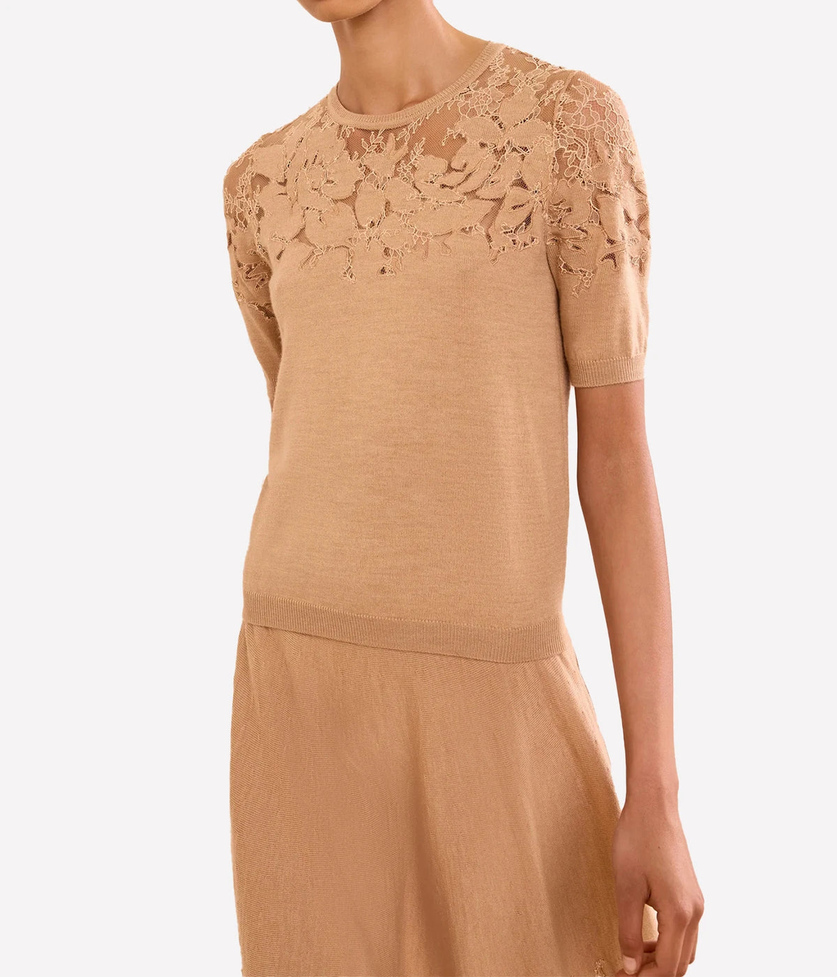 Model wearing Ulla Johnson Ella Short Sleeve Lace Top in Almond, front view