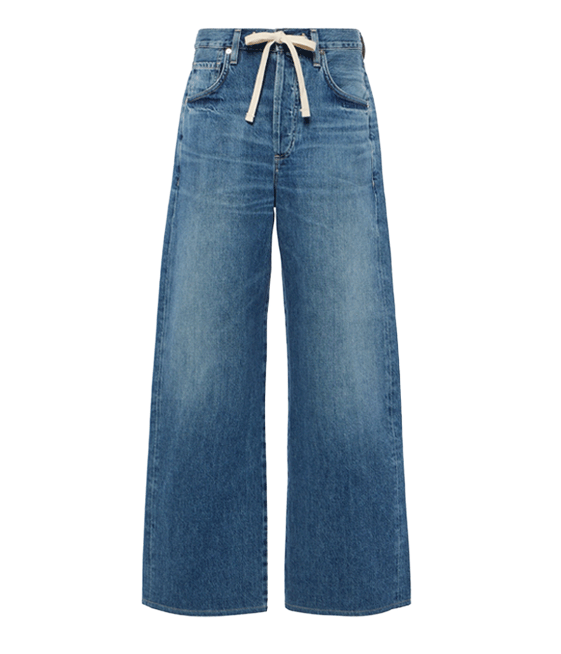 Wide-leg cut for a relaxed, laid-back look.
Drawstring waist for an adjustable, comfortable fit.
Button fly closure for a classic, vintage-inspired detail.
Full-length inseam perfect for pairing with sandals or heels.
Made from 100% organic cotton for a sustainable and breathable fit.

