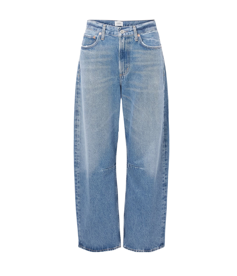 ALT Text: Miro Jean in blue, featuring a tapered barrel leg silhouette and zip fly closure, crafted from 100% regenerative cotton.