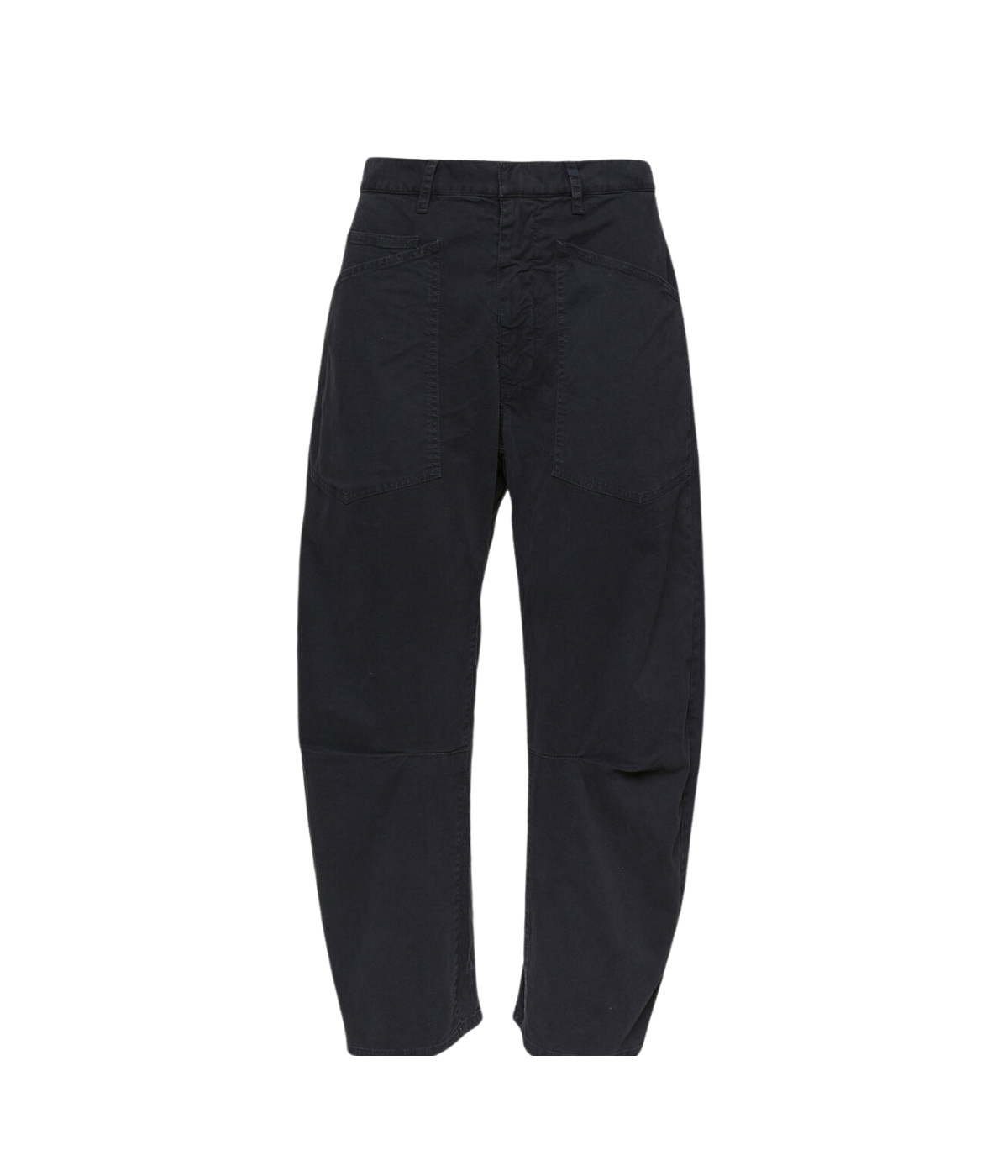 Oversized pants with curved silhouette and front patch pockets, styled with a T-shirt and sneakers for a casual chic look.