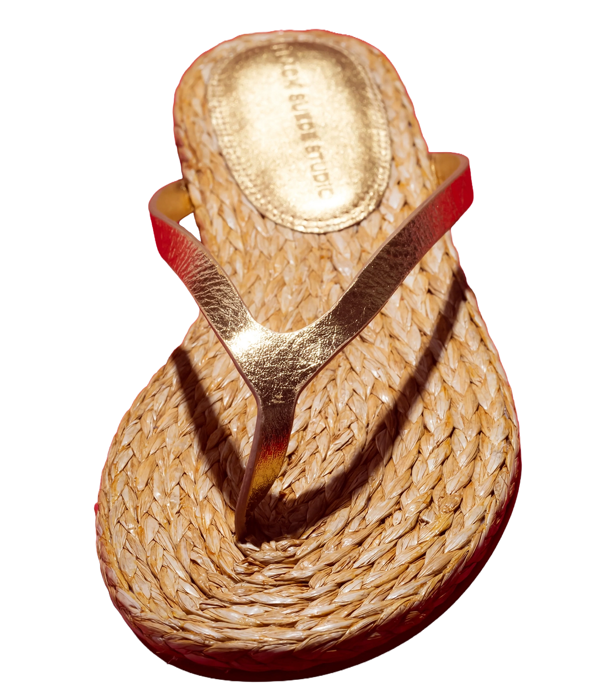 A single woven straw-style thong sandal with metallic gold straps and trim - Alaya Sandal in Gold Metallic
