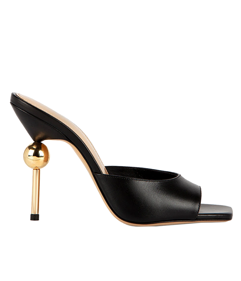 Italian Craftsmanship: Made in Italy from premium smooth leather, ensuring long-lasting quality and timeless style.
Chic Design: The slip-on style with a playful peep-toe opening delivers an effortlessly sophisticated look.
Gold Mirror Sphere Detail: The unique gold mirror sphere adds a contemporary, luxurious touch, elevating the design.
Versatile: Transition seamlessly from casual daywear to evening elegance, making these mules a go-to option for various occasions.