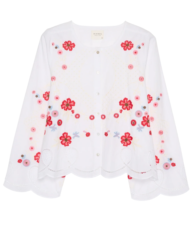 A white long-sleeve button-front blouse with red and pink floral embroidery and eyelet lace trim, shown flat against a white background.