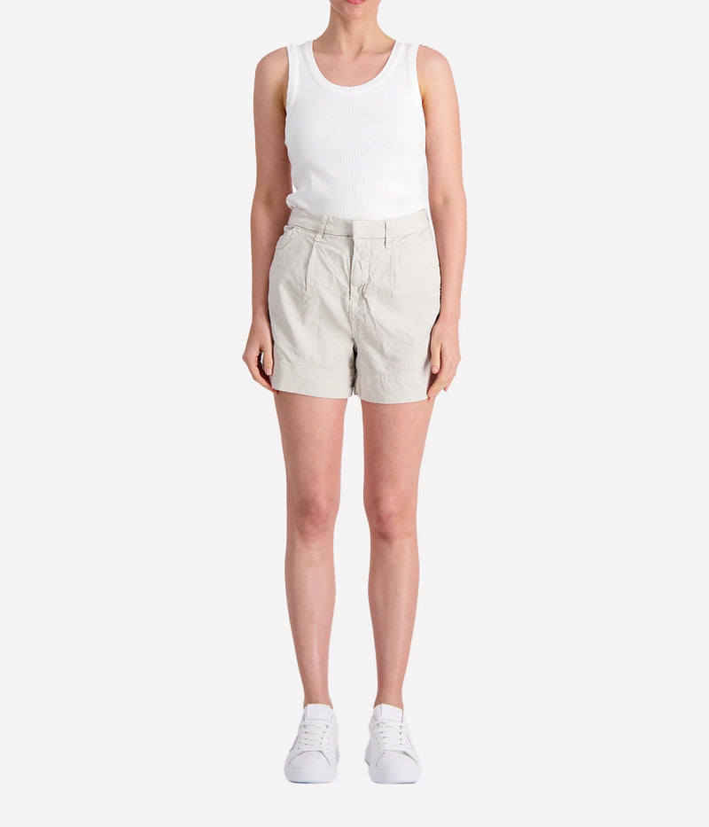 Lightweight tailored shorts in cement grey, featuring a mid-rise fit, sleek silhouette, clean waistband, and side pockets.