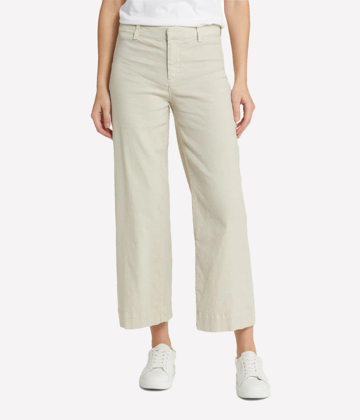High-rise, wide-leg linen pants with a cropped hem and clean design, styled with a silk blouse and heels for a polished look.