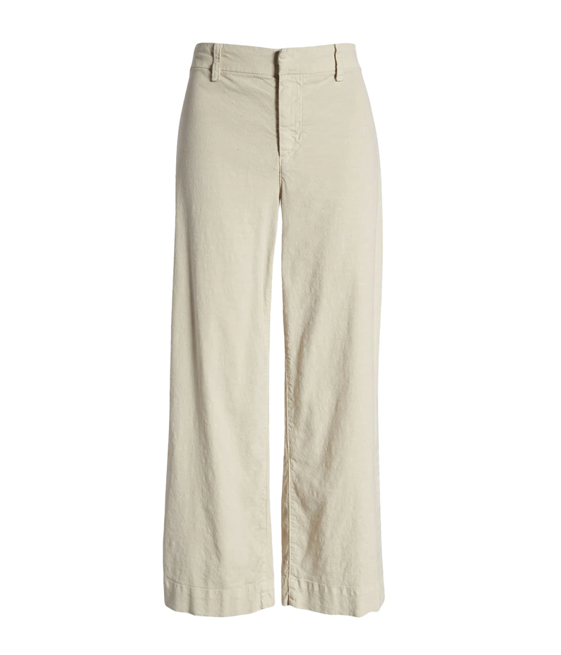 High-rise, wide-leg linen pants with a cropped hem and clean design, styled with a silk blouse and heels for a polished look.