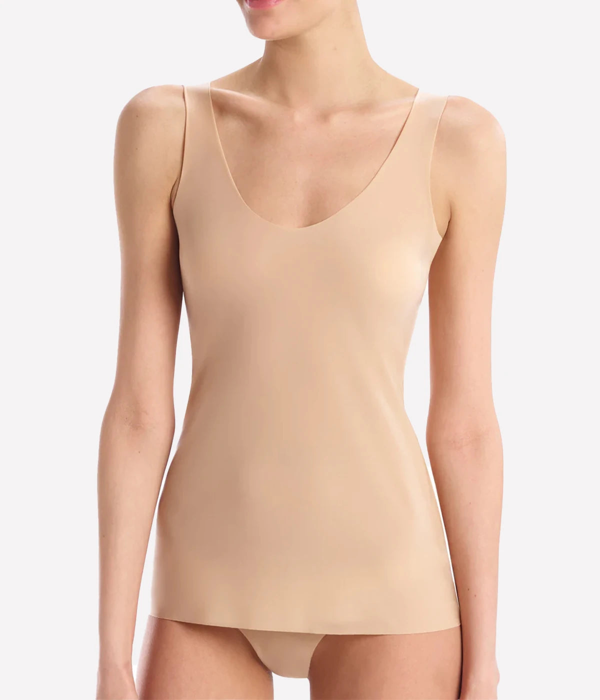 The Whisper Weight Cami is the lightweight layer you'll wear with everything or as a tight-fitting second layer. Constructed with a breathable European microfiber that disappears against the skin, finished with raw-cut edges that lay flat against the body for a seamless look, in a neutral beige colour. Everyday wear or underwear.