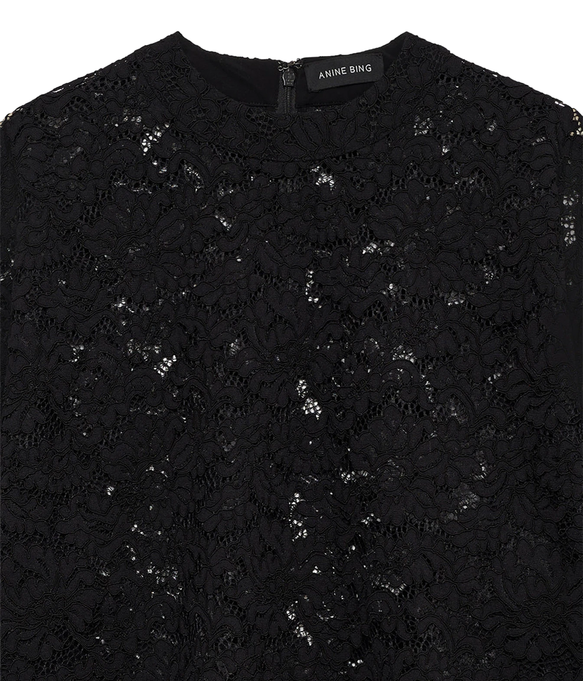 Close-up of the Anine Bing Zeina Top in Black Lace, highlighting the intricate floral lace texture, round neckline and sheer finish.