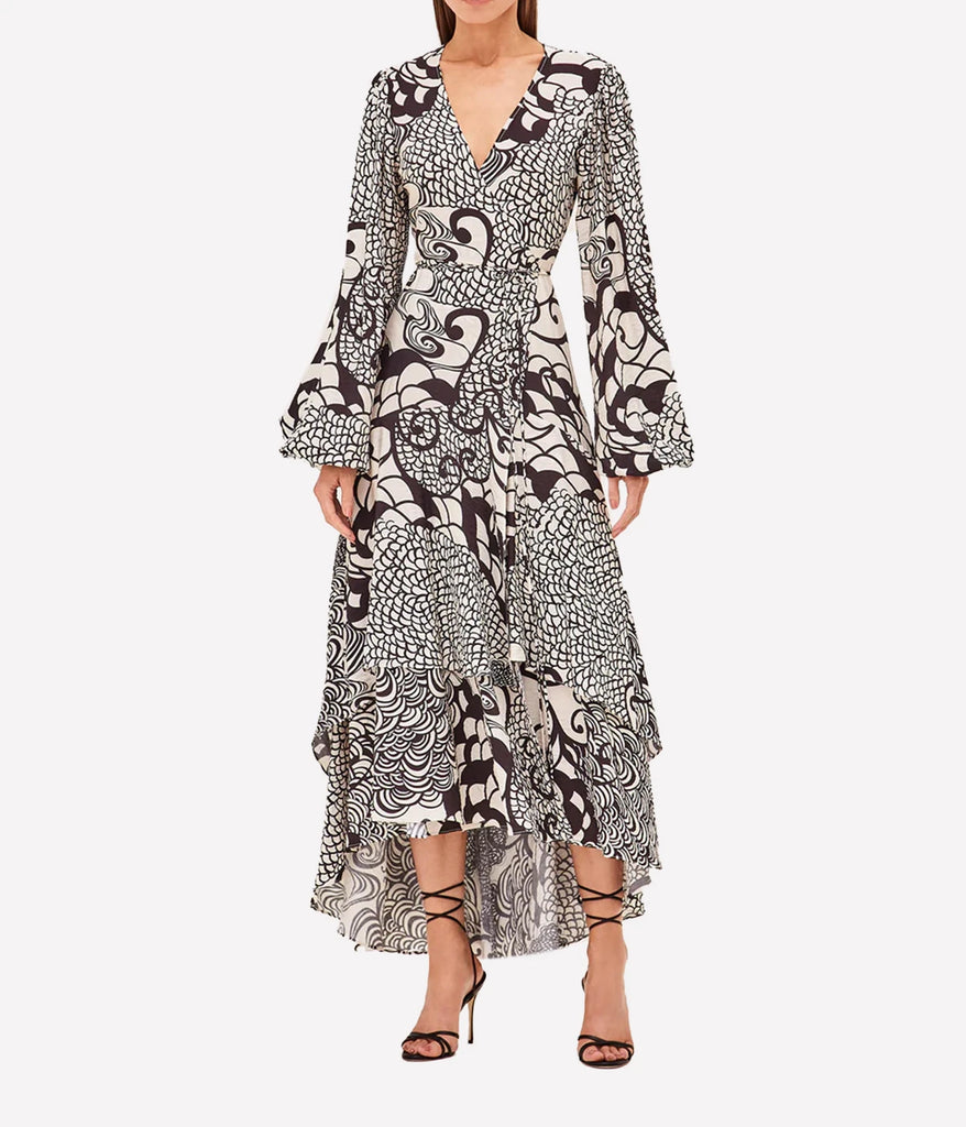 A special occasion stand out dress, long sleeves, v neckline, black and cream floral print, wrap detailing, flared sleeves and midi length. Special occasion dress, lunch with girlfriends, bra friendly, comfortable made internationally.  