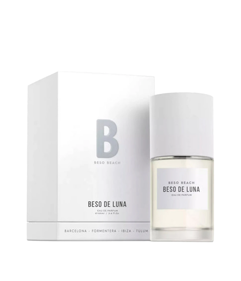 Beso de Luna Eau de Parfum by Beso Beach, shown with its white packaging box and the clear glass perfume bottle with a white cap on a white background.