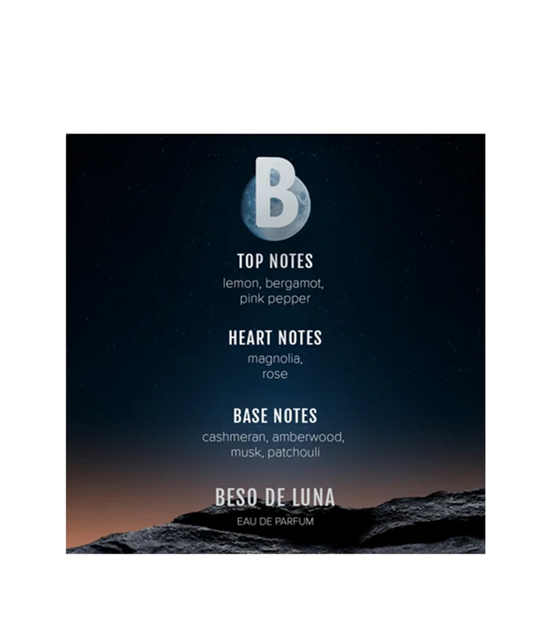 A square fragrance label for Beso de Luna Eau de Parfum, featuring a dark starry sky and rocky horizon with scent notes listed below a large letter B logo.