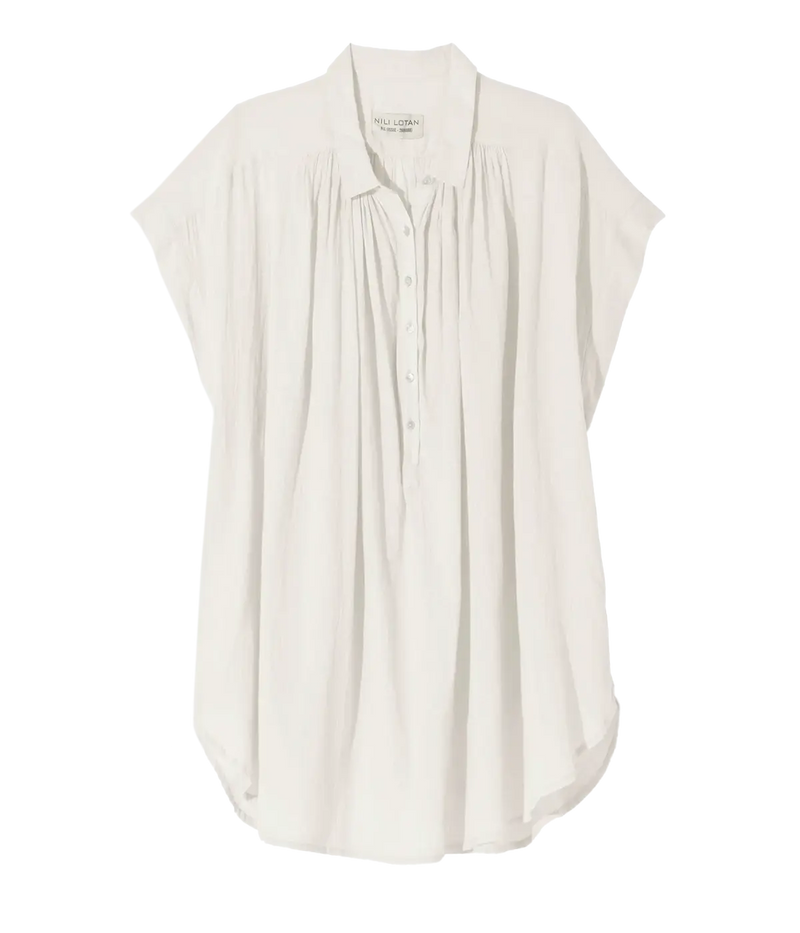 A white blouse with a small collar, short sleeves, and a shirttail hem.