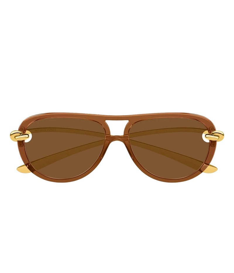 Bottega Veneta Knot Aviator Sunglasses in Brown with a translucent brown frame, brown lenses and gold-tone metal temple details.
