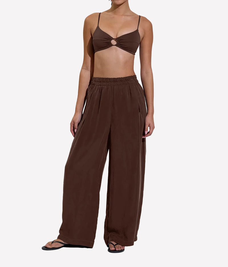 1. Model styling the Coco Top in Cold Brew with brown wide-leg pants.