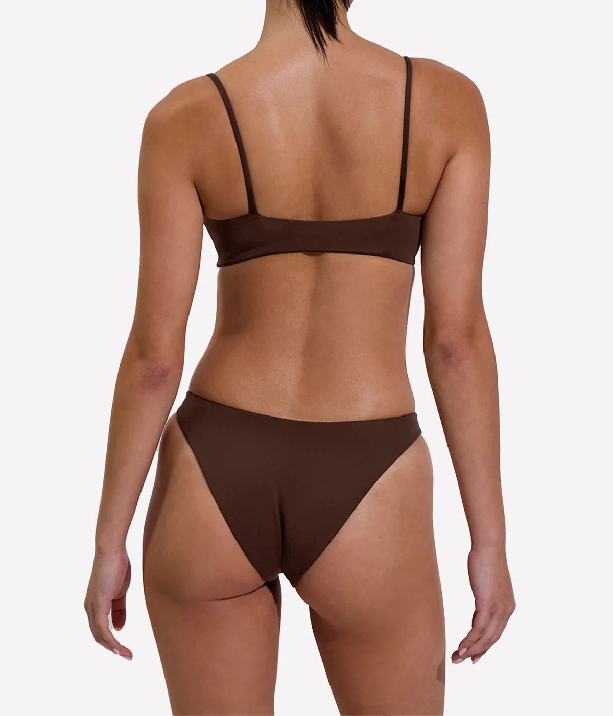 Model wearing the Coco Top in Cold Brew with matching bikini bottoms, back view.