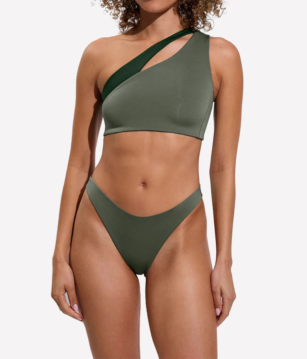 Model wearing the Left On Friday Dip Bottom in Agave with matching green swim top, front view.