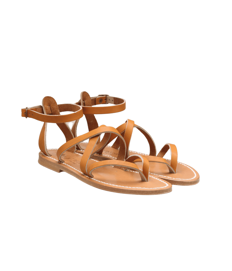 Pair of tan sandals on a transparent background