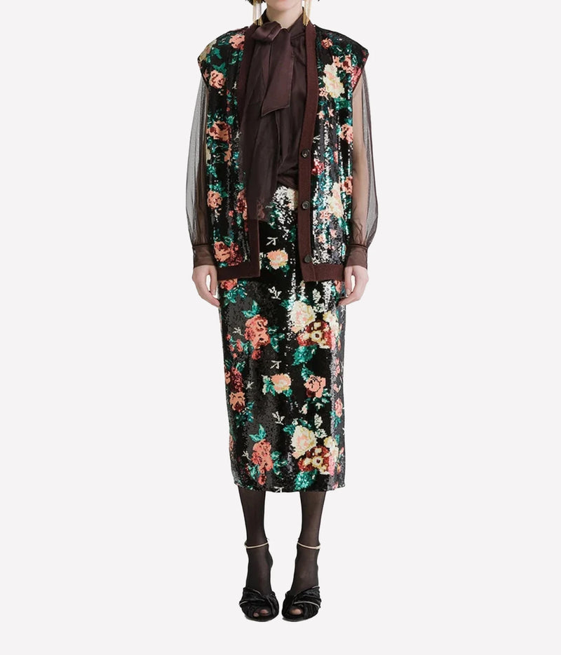 Woman wearing the Forte Forte silk satin sash top in Fondant with a floral print skirt and a sheer layer over the top, full-length front view.
