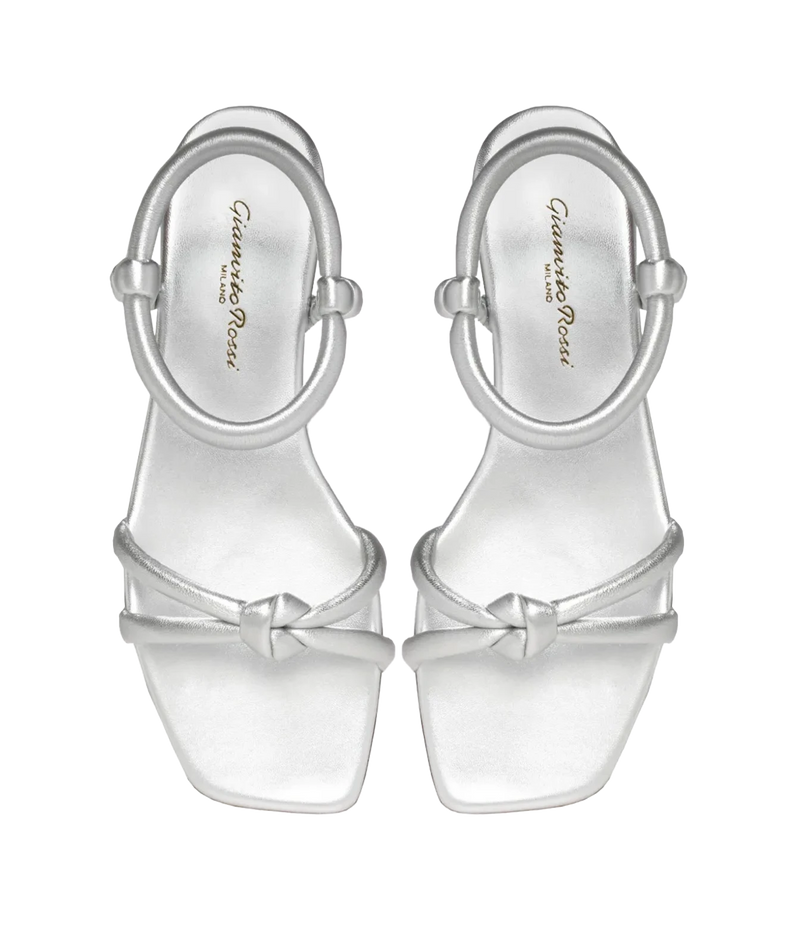 Top-down view of a pair of Gianvito Rossi Juno 05 Nappa in Silver, showing the square toes, knotted straps and silver leather footbeds