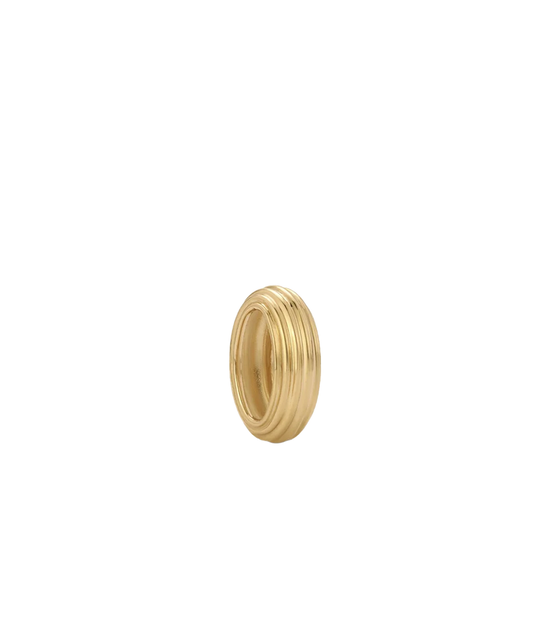 Adina Reyter Groovy Spacer Big Bead in 10K Yellow Gold shown at an angle, showing its ribbed texture