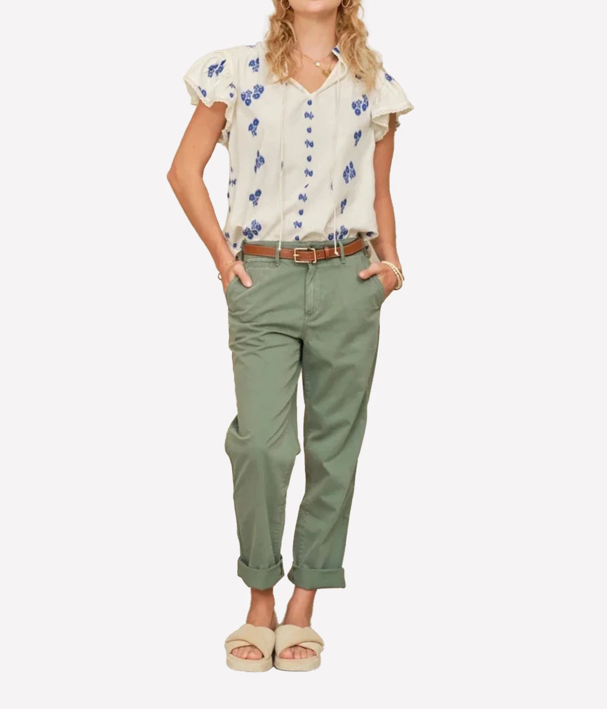 Model wearing the M.A.B.E Iris Woven Frill Short Sleeve Top in Blue – full-length view