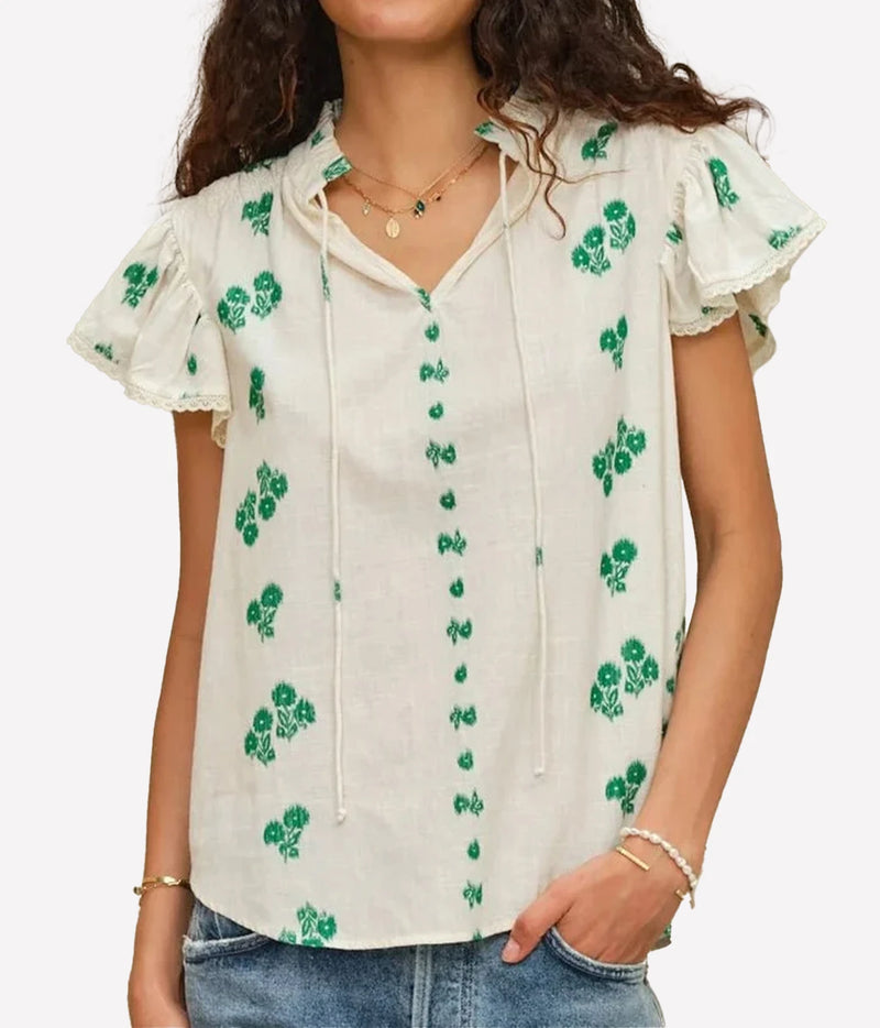 Model wearing the M.A.B.E Iris Woven Frill Short Sleeve Top in Green – front view