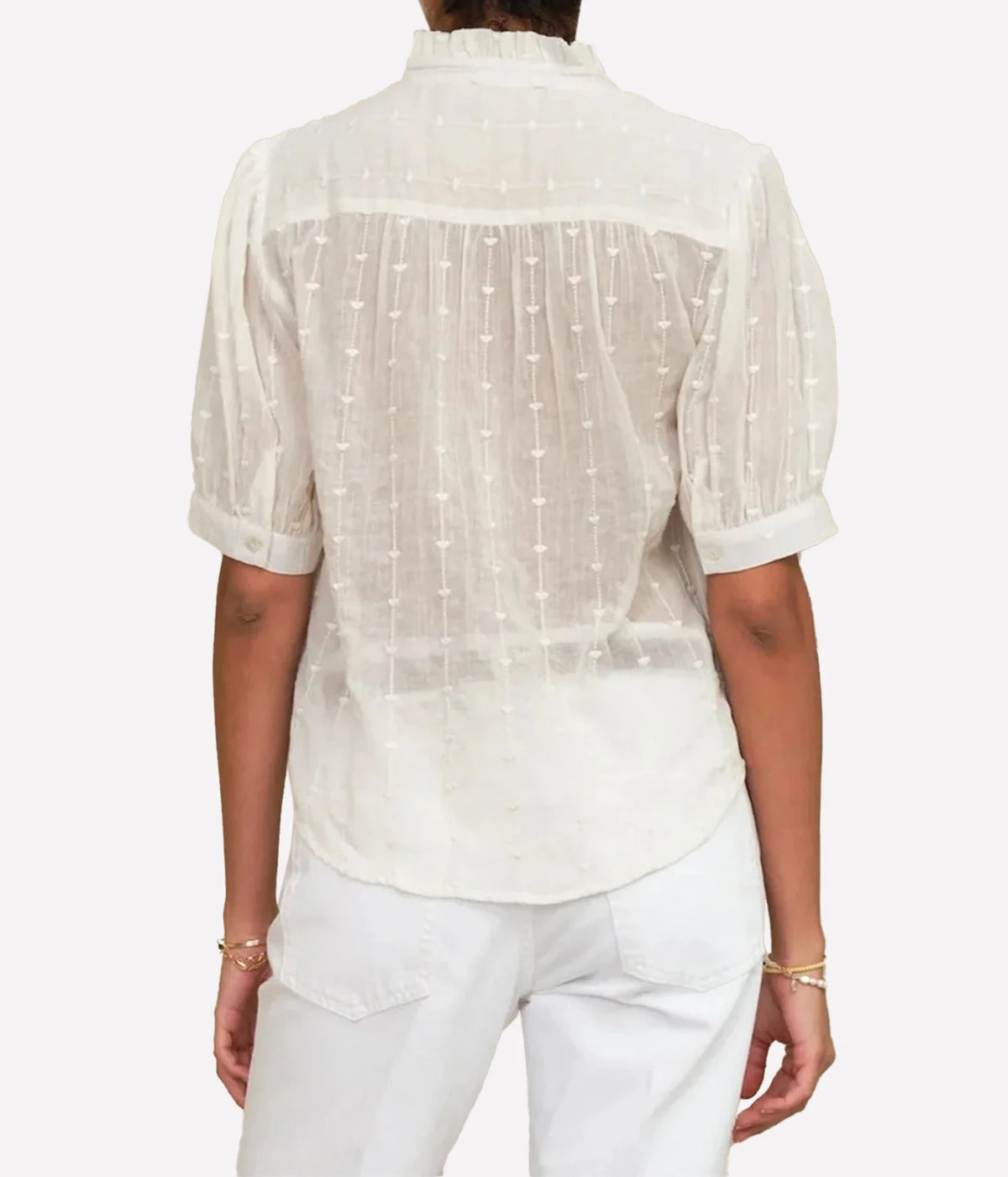 Model wearing the M.A.B.E Alli Embroidered Short Sleeve Top in Ecru – back view