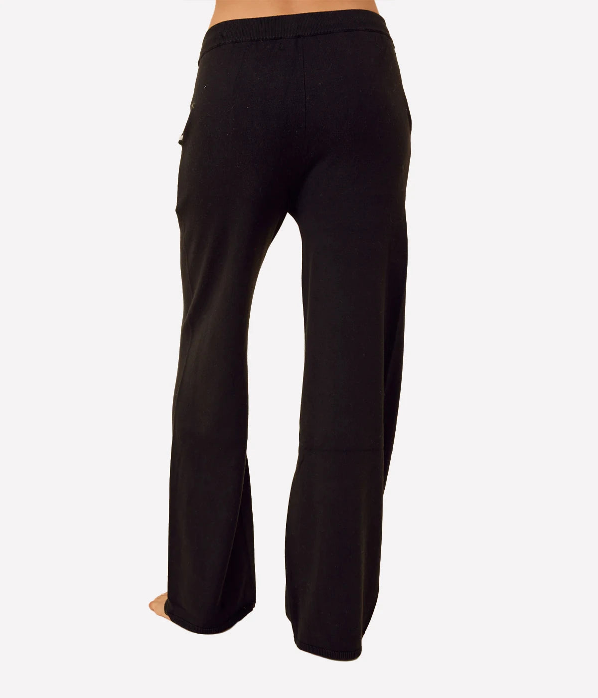One Grey Day Bianca Pant in Black, rear three-quarter view highlighting wide-leg fit and fluid drape, luxury lounge pants