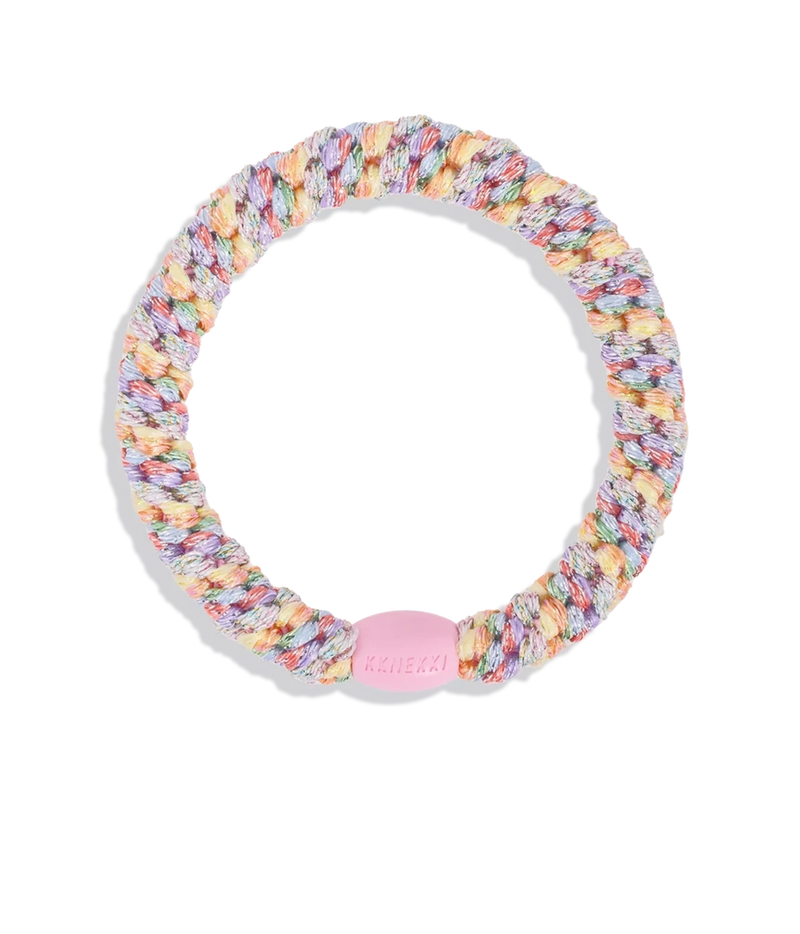 A multicolour braided elastic hair tie with a pink plastic end cap featuring the brand name 'Kknekki' embossed