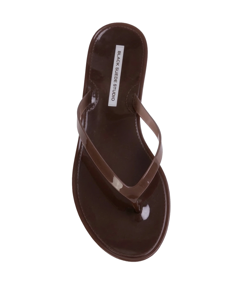 A single glossy dark brown thong sandal shown from a top-down view - Crystal Sandal in Chestnut