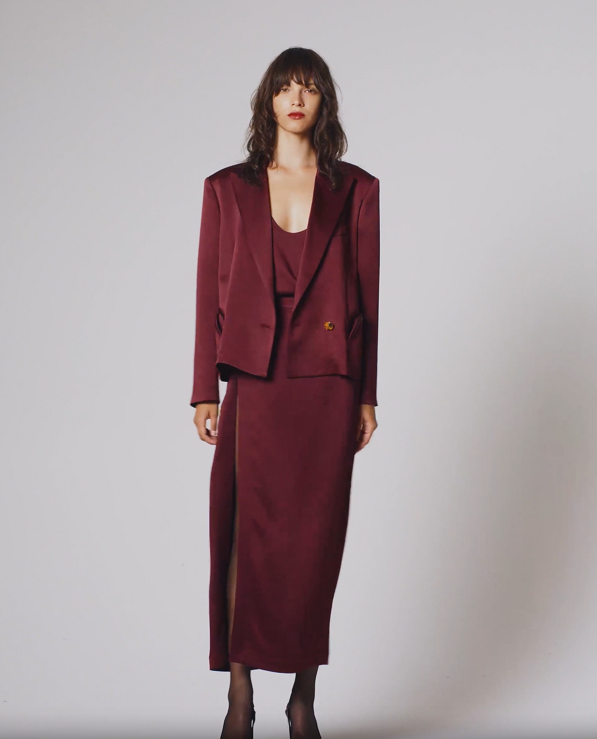 video of Novalis Sunfire Blazer In Wine - female model wearing blazer and matching midi skirt