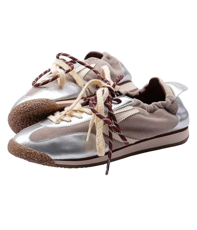 A pair of low-top sneakers with a metallic silver and taupe suede look upper, featuring cream laces, brown textured midsoles, Puraai 6.02 Panther Sneaker in Radio