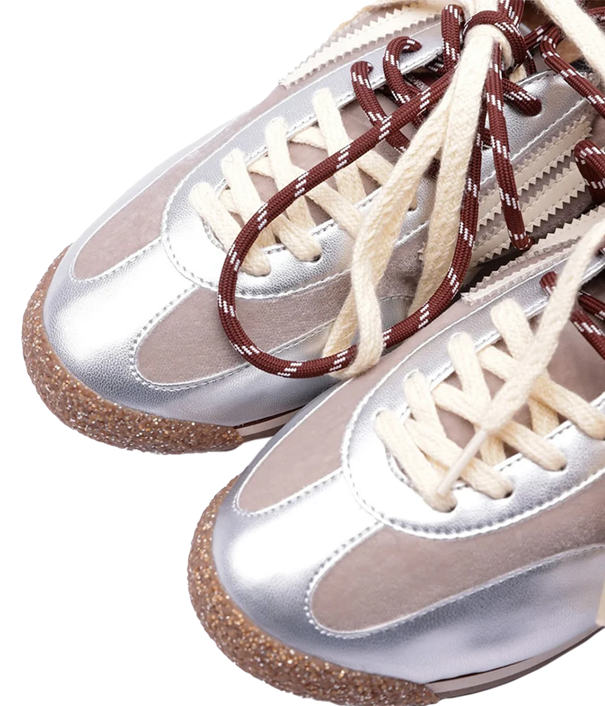 Close-up of a pair of low-top sneakers with metallic silver and taupe panels and dark brown and cream double laces, Puraai 6.02 Panther Sneaker in Radio