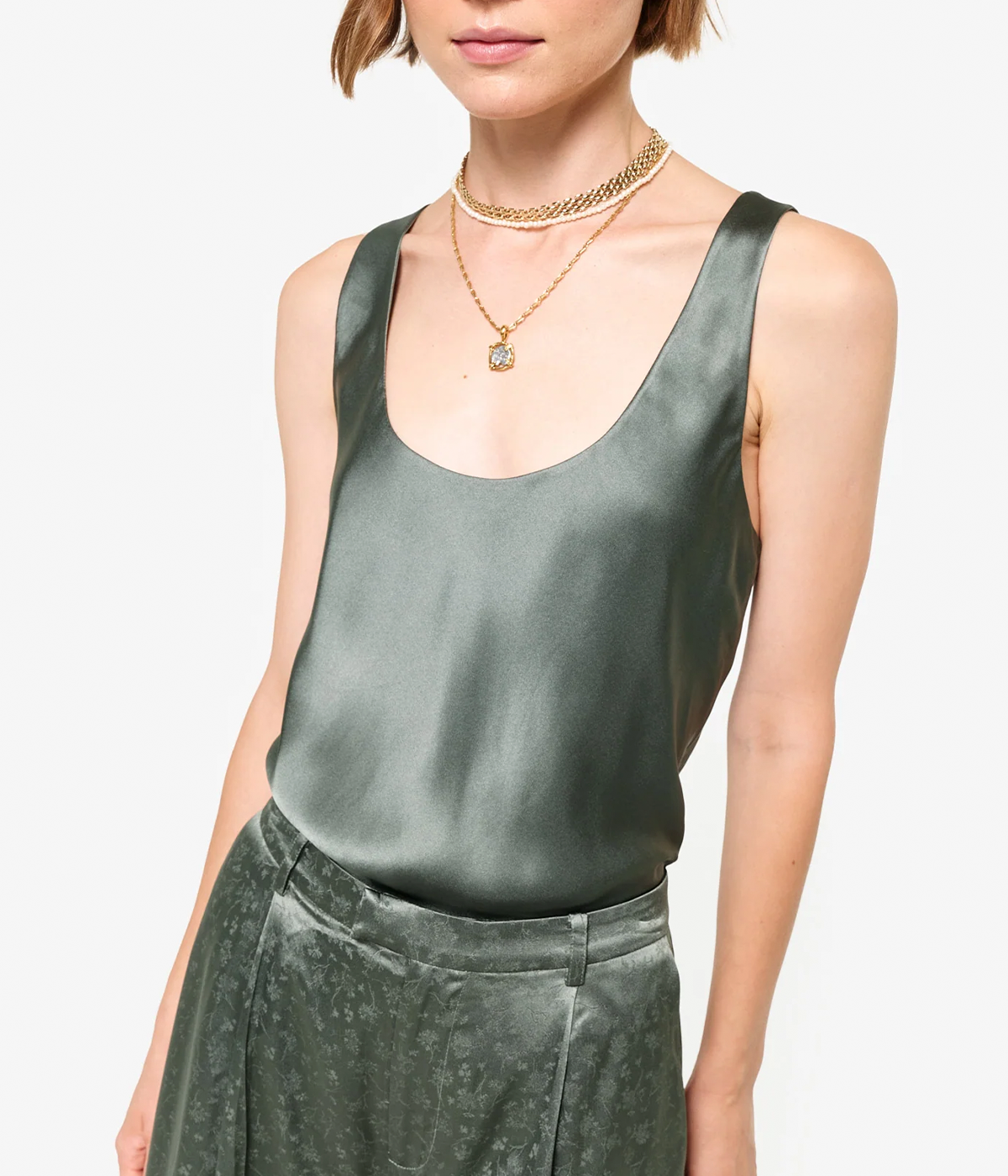 ALT text: Scoop neck dress with bra-friendly straps, side slit at hem, and fully lined finish.