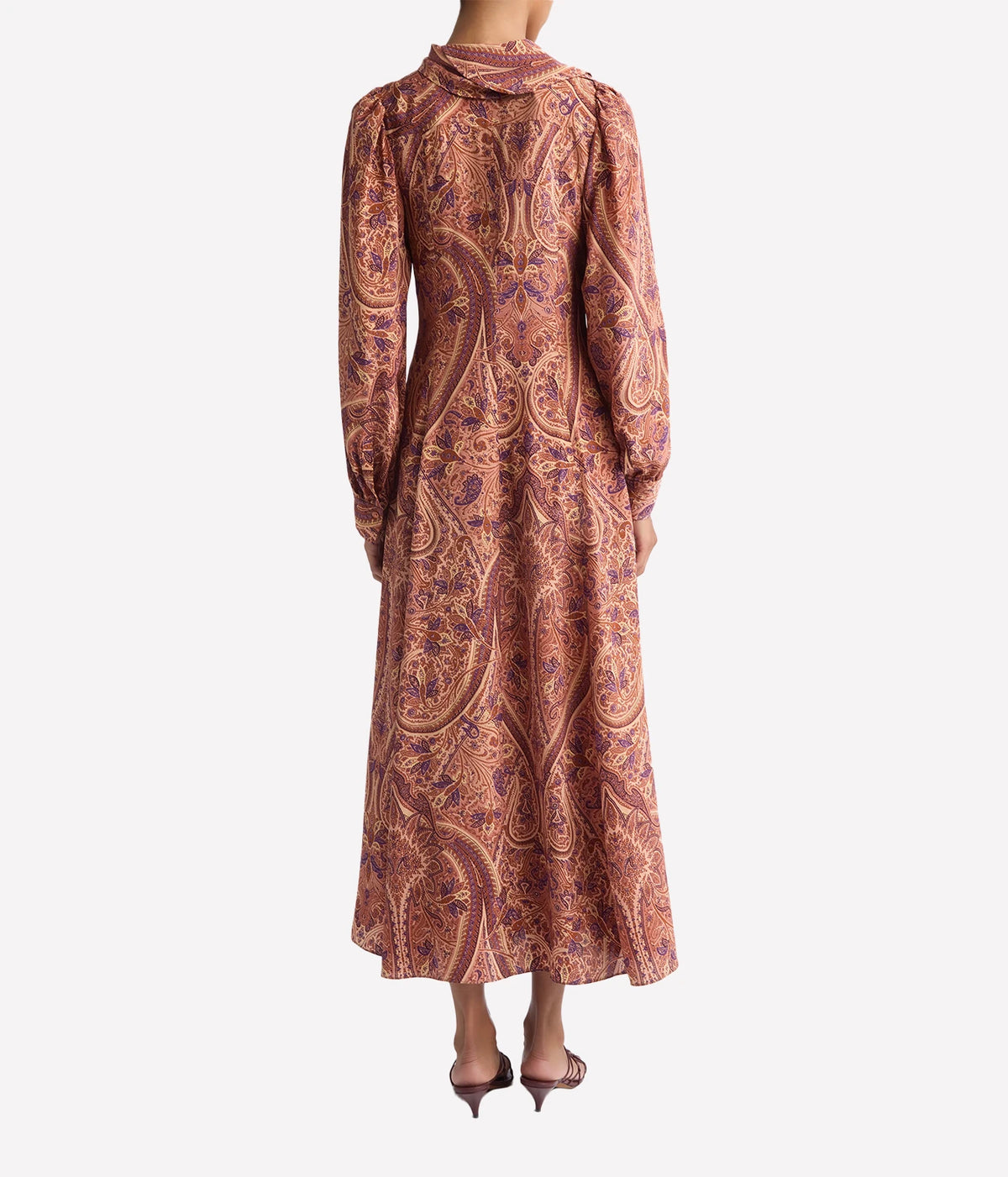 Model wearing Ulla Johnson Sabrina Long Sleeve Silk Dress in Rosette, back view