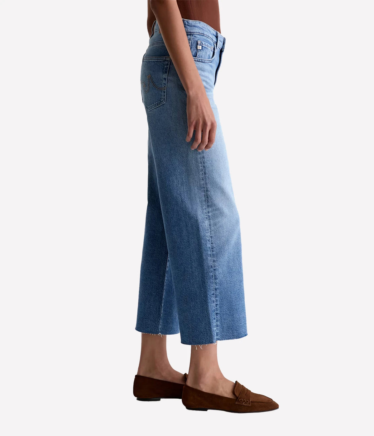 AG Jeans Saige Wide Leg Crop in 17 Years Duet, on model, side view