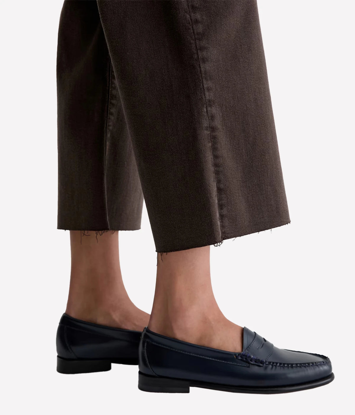 AG Jeans Saige Wide Leg Crop in Sulfur Burnt Umber, close-up of raw cropped hem