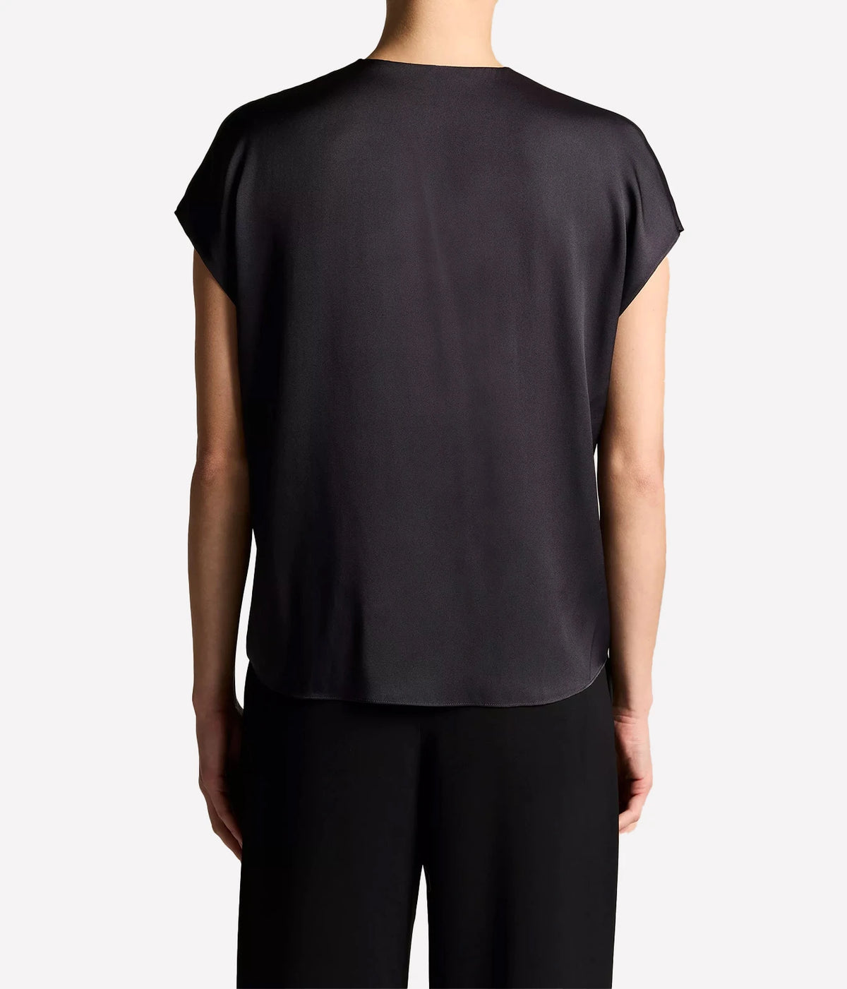 Woman wearing an ink double V-neck shell top, back view