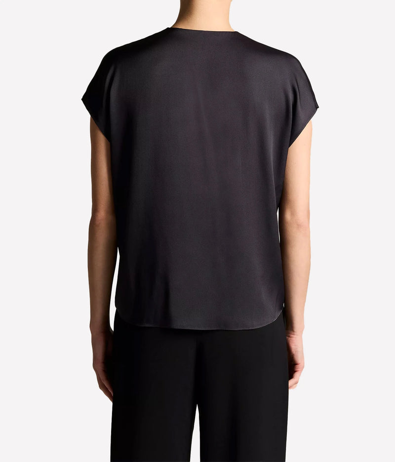 Woman wearing an ink double V-neck shell top, back view