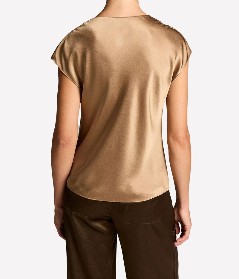 Woman wearing a Carmello cowl neck blouse, back view